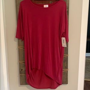 Brand new XS LuLaRoe dark pink Irma top